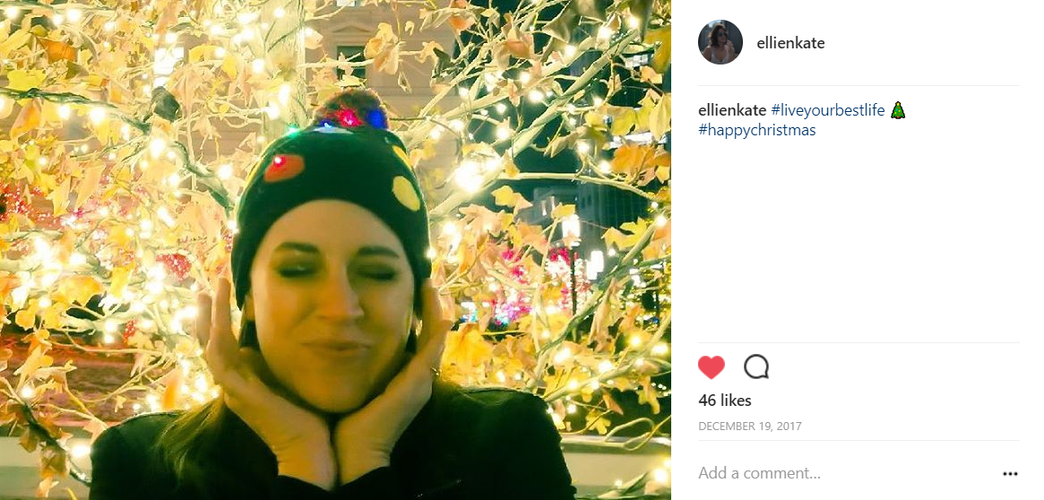 Ellie's day two post of her in front of Christmas lights.