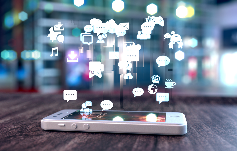 social media alerts bombard a smartphone creating marketing noise