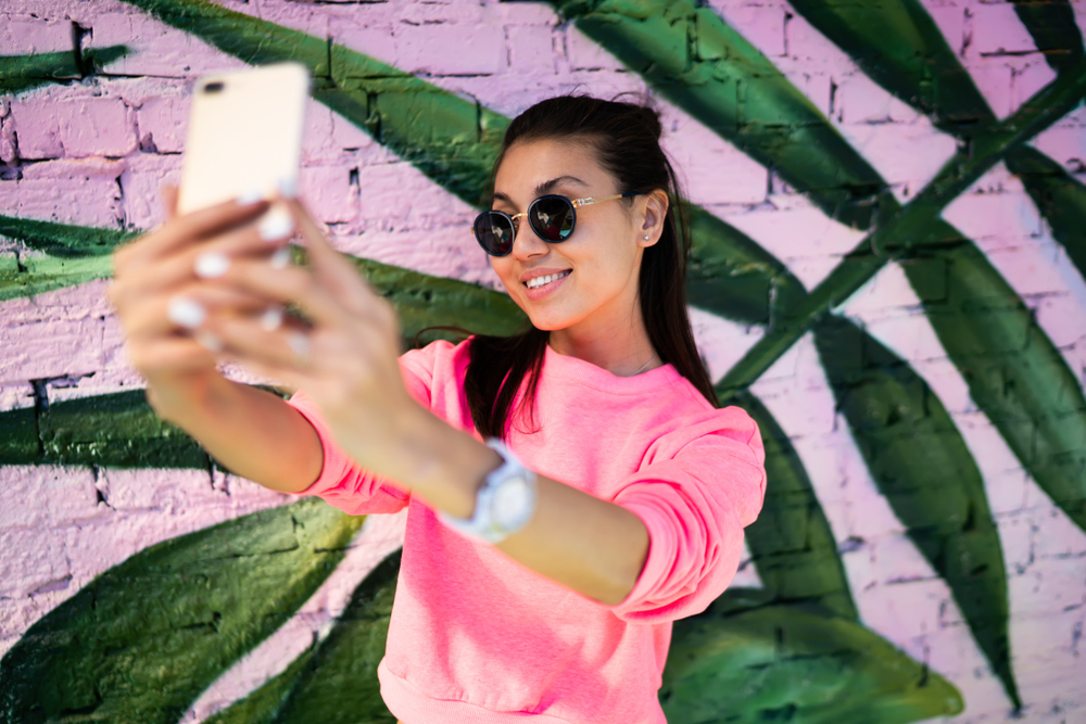 a woman taking a selfie